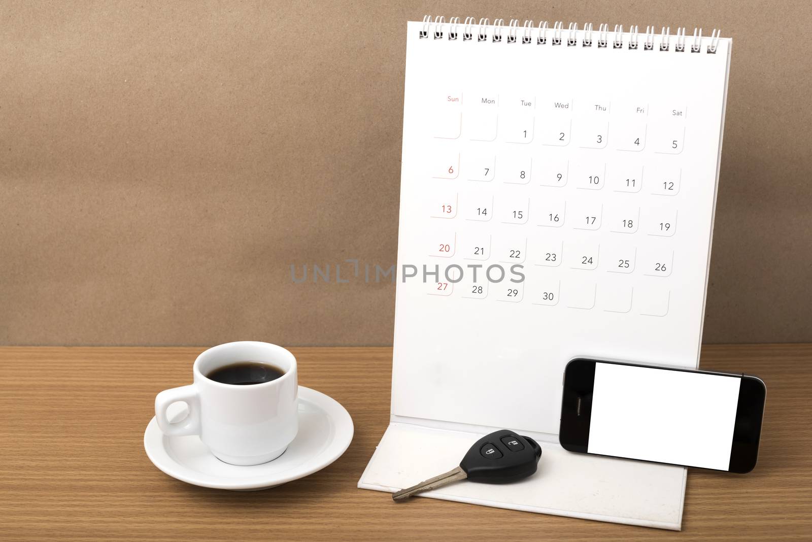 coffee,phone,car key and calendar