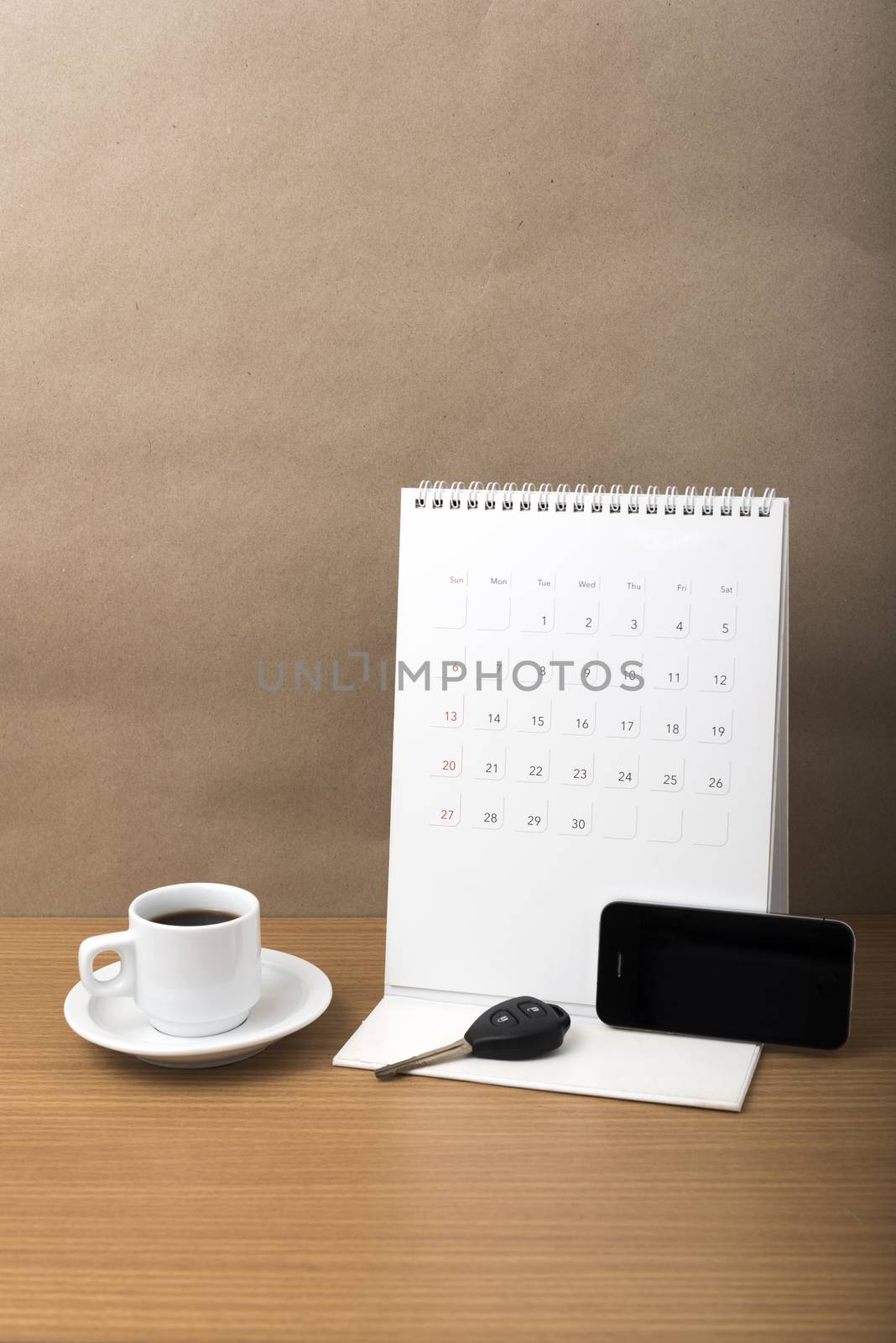 coffee,phone,car key and calendar