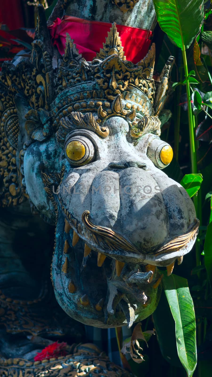 Close uo of Chinese Dragon at the entrance to a temple in Bali, Indonesia