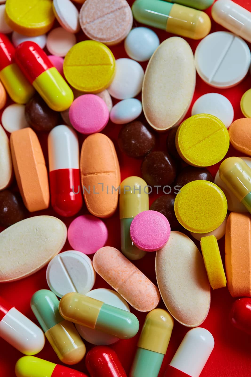 Close up of many colorful pills. Top view with copy space. Medicine concept