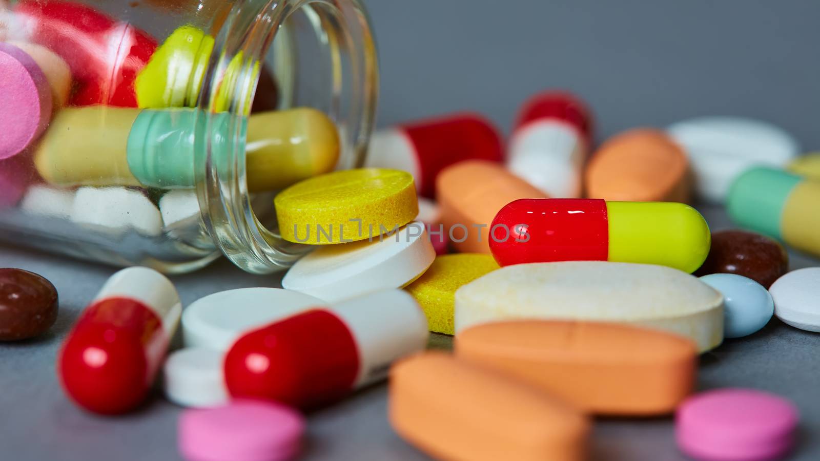 Close up of many colorful pills by sarymsakov