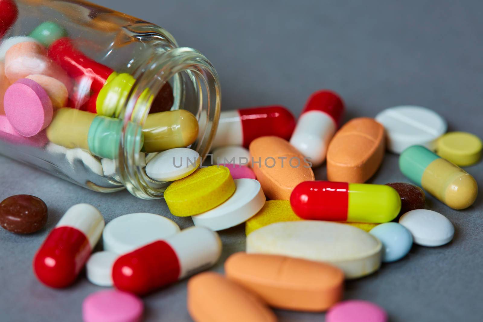 Close up of many colorful pills. Top view with copy space. Medicine concept