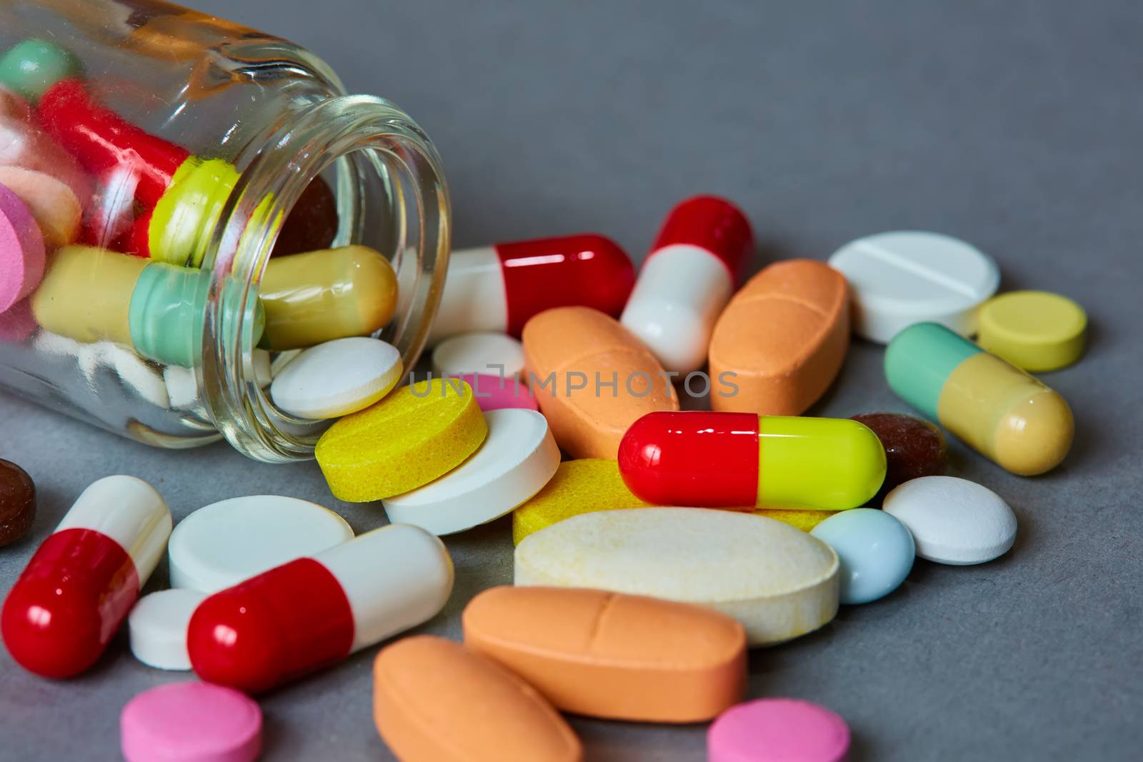 Close up of many colorful pills. Top view with copy space. Medicine concept