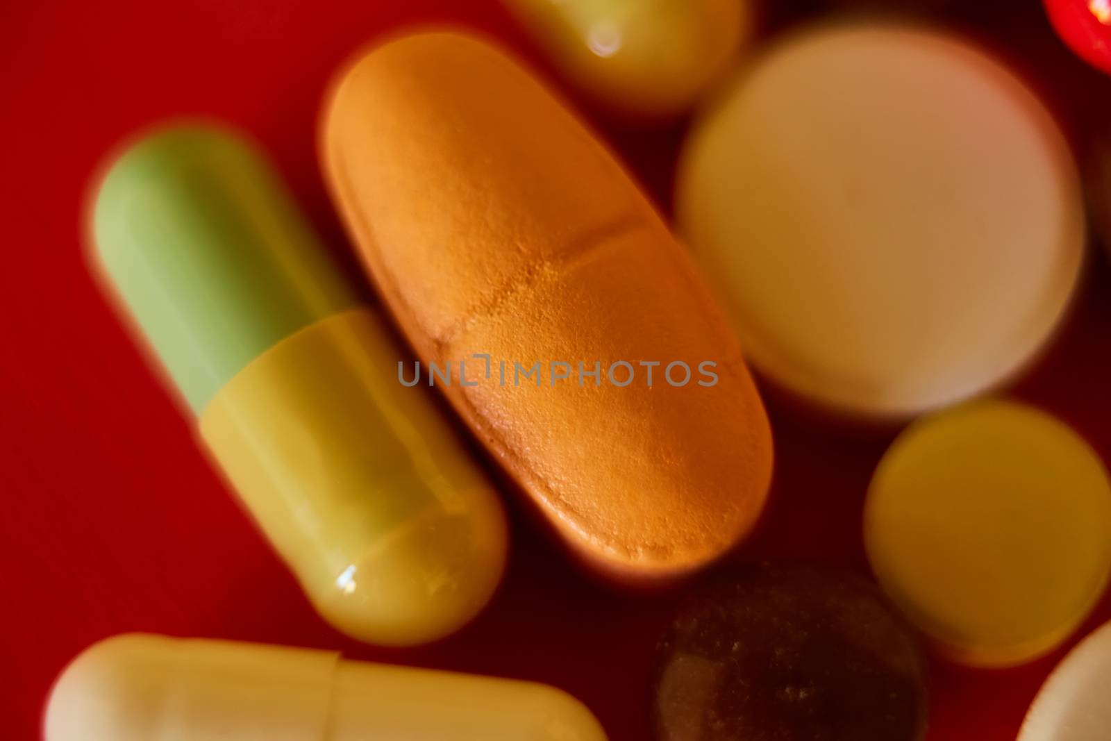 Close up of many colorful pills. Top view with copy space. Medicine concept. Shallow dof