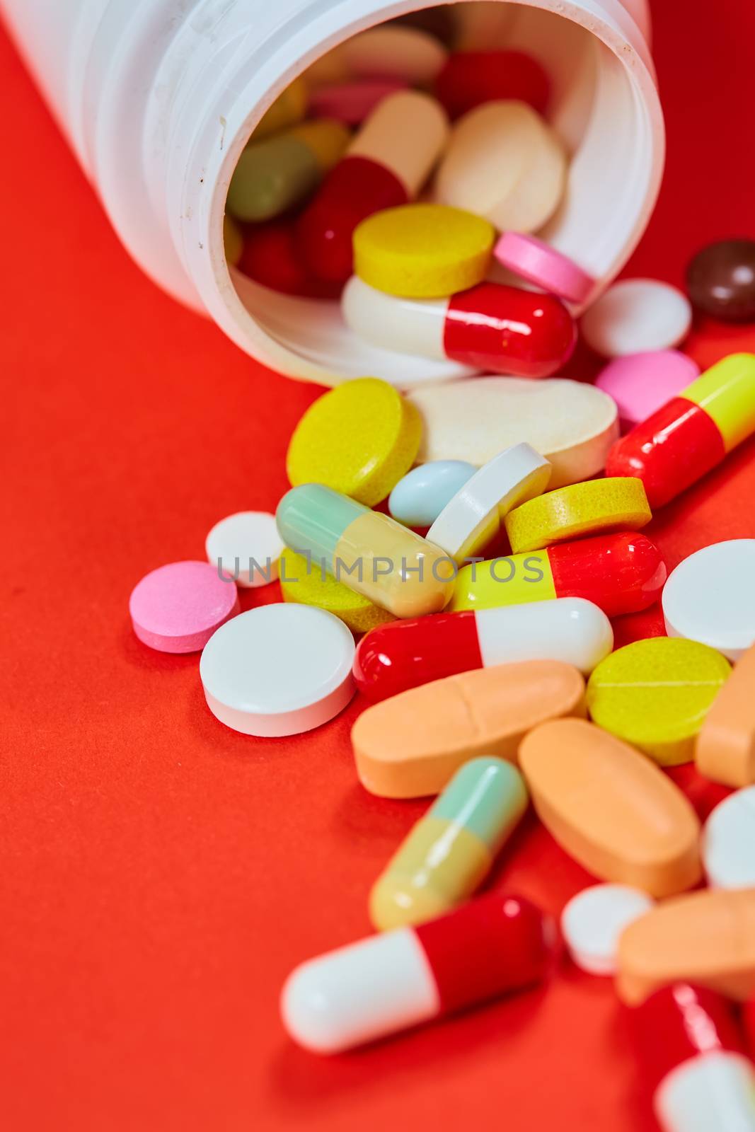Close up of many colorful pills. Top view with copy space. Medicine concept. Shallow dof