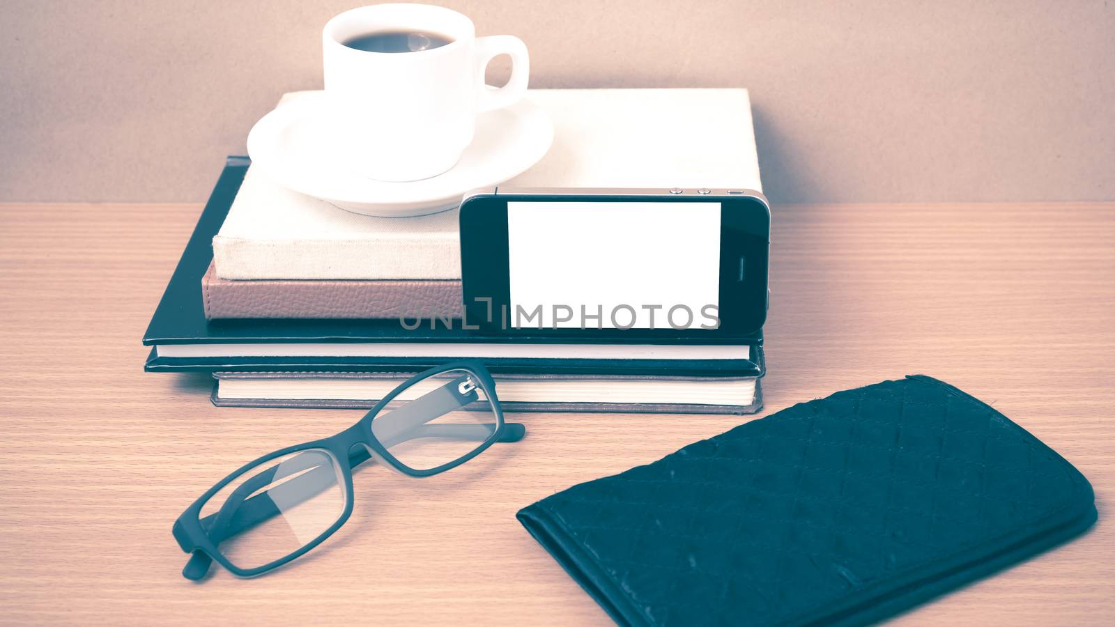 coffee,phone,eyeglasses,stack of book and wallet by ammza12