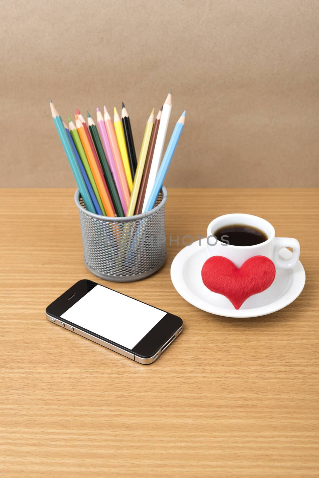 coffee,phone,color pencil and heart on wood table background