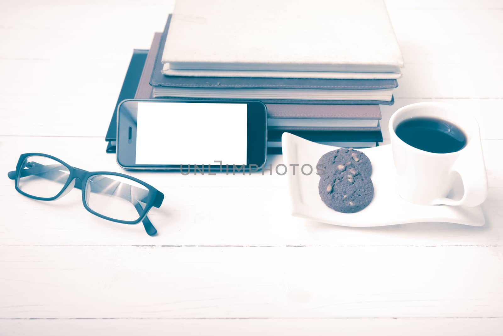 coffee cup with cookie,phone,stack of book and eyeglasses vintag by ammza12