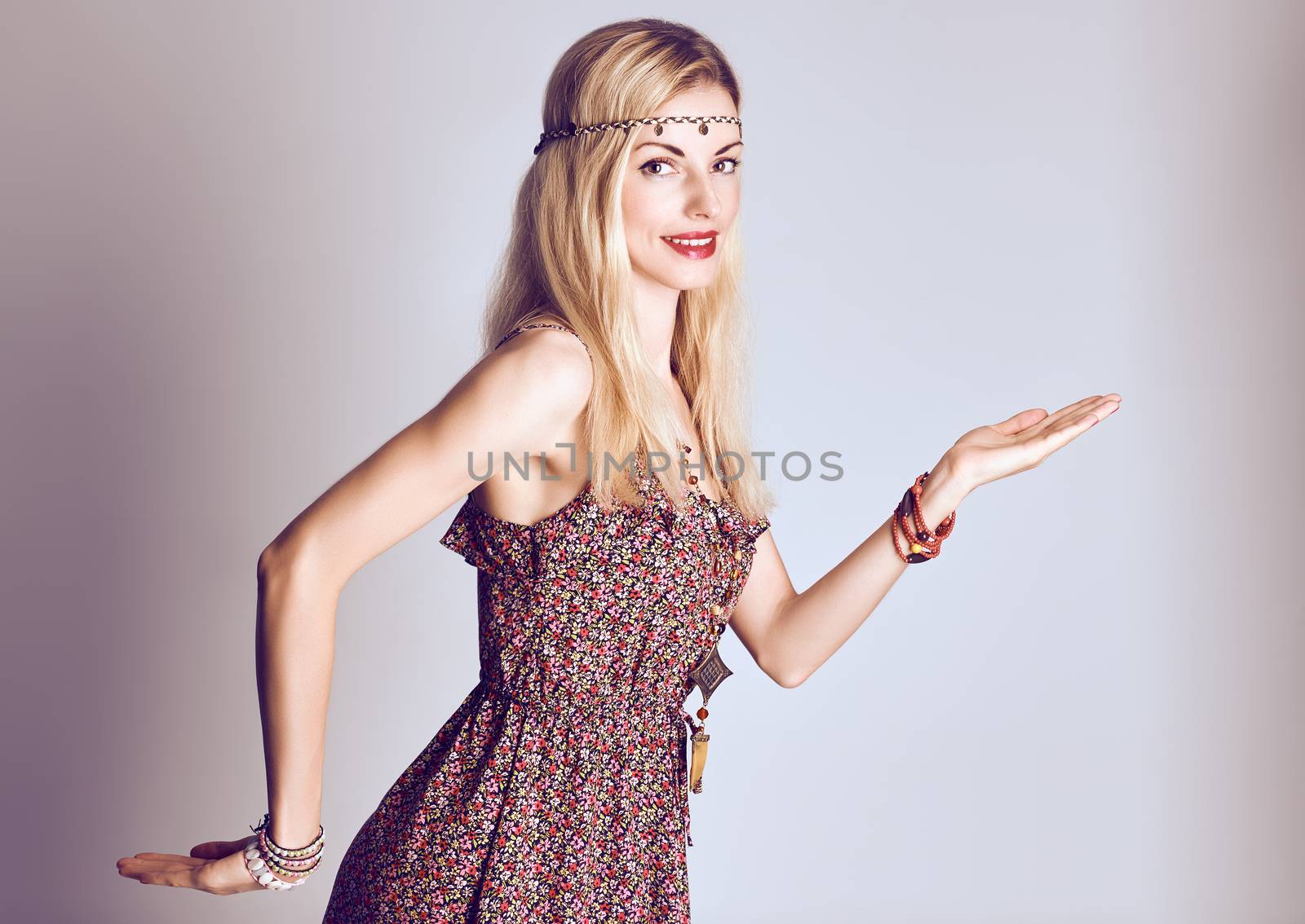 Hippie boho woman happy smiling. Beauty young playful positive blonde, long hair, ethnic accessories relax, having fun. Floral sundress, romantic style. Attractive loving girl. Unusual creative,people