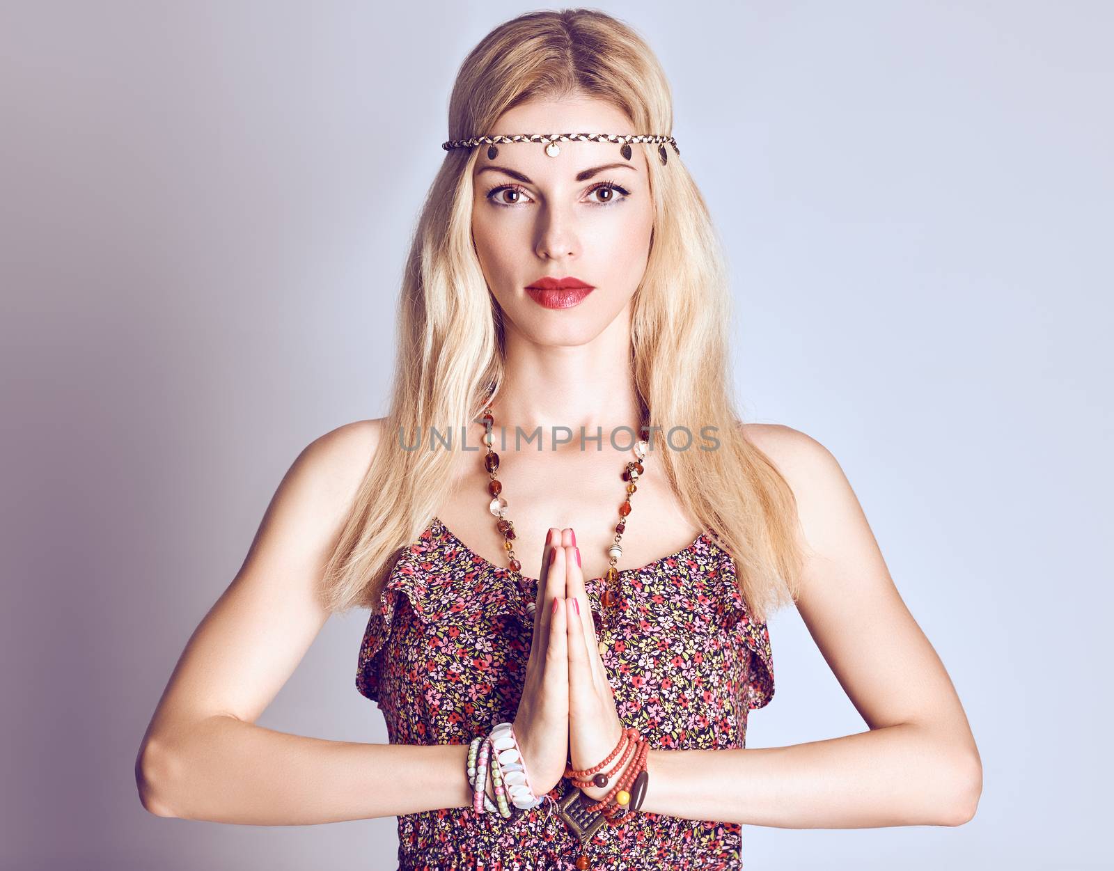 Beauty portrait woman doing yoga. Boho hippie girl meditates, enjoying calm, relax and harmony, ethnic accessories. Positive blonde, long hair in stylish floral sundress. Unusual creative, people
