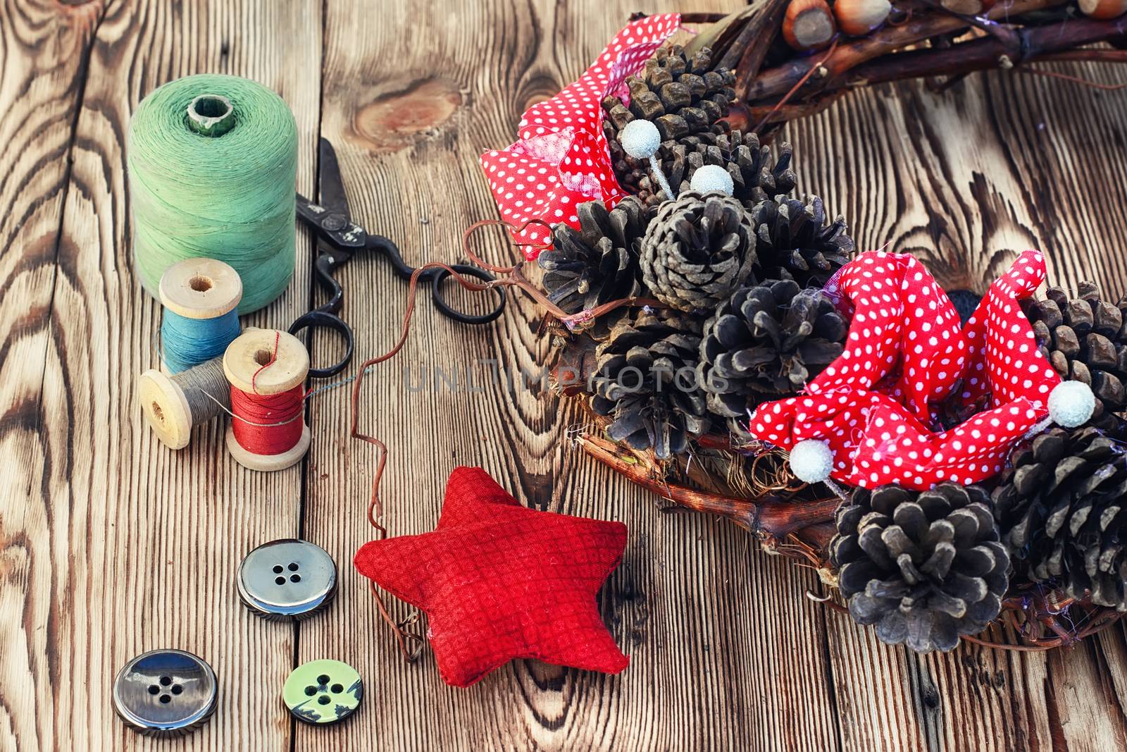 tools of crafts from buttons and thread for the manufacture of Christmas decoration