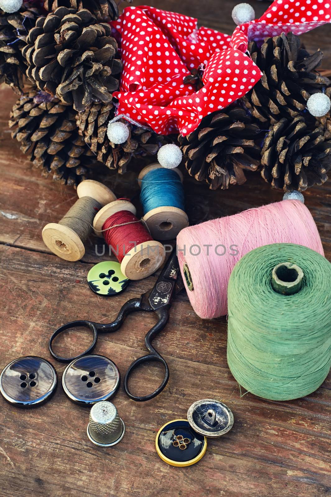tools of crafts from buttons and thread for the manufacture of Christmas decoration