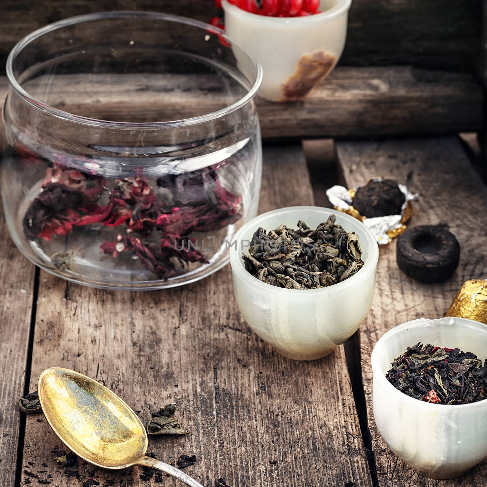 leaves of the tea bush,the stylish cups prepared for brewing