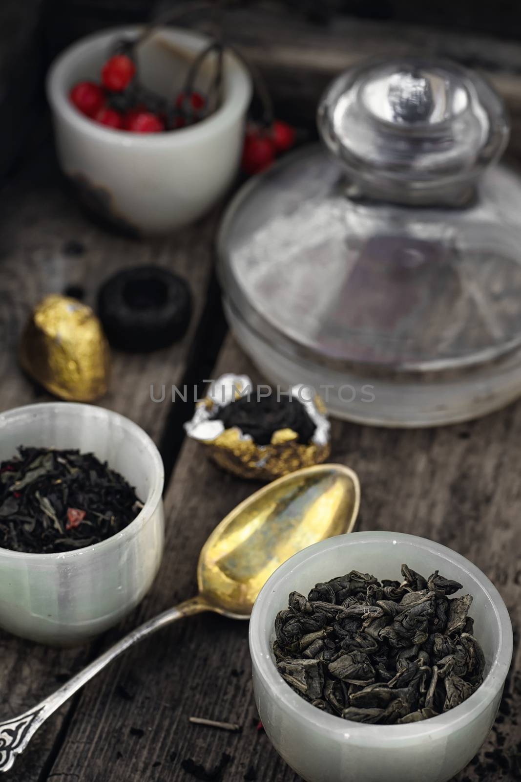 leaves of the tea bush,the stylish cups prepared for brewing