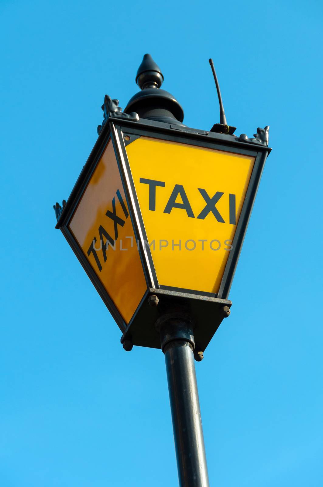 Vintage taxi sign in London, UK