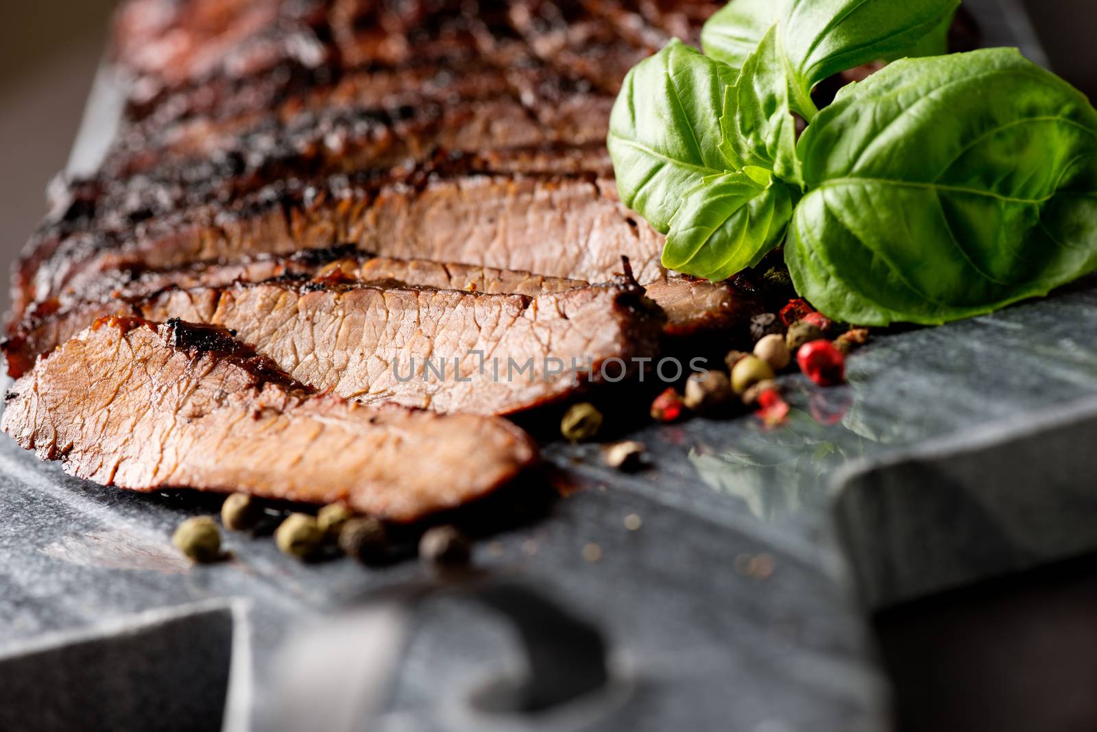 sliced medium grilled beef steak by Nanisimova