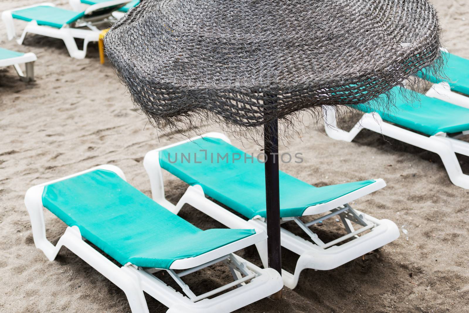 Sunbathing benches at beach