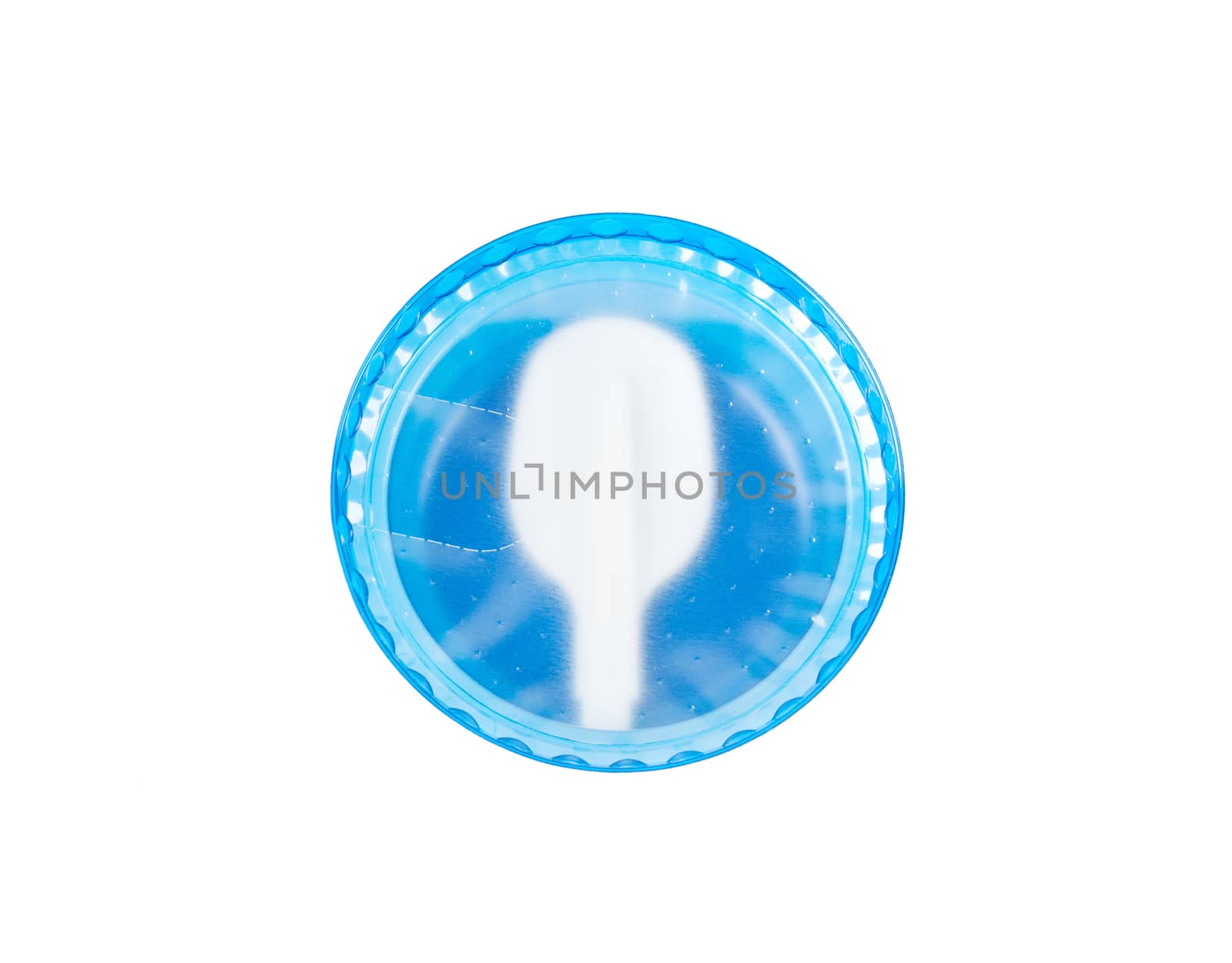 Folding white disposable plastic spoon in yogurt cap isolated on white background