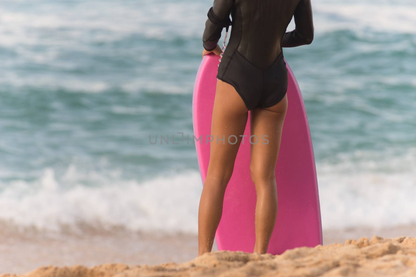 Female Surfer Stands Beach Watching Surf Waiting Pink Body Board by ChrisBoswell