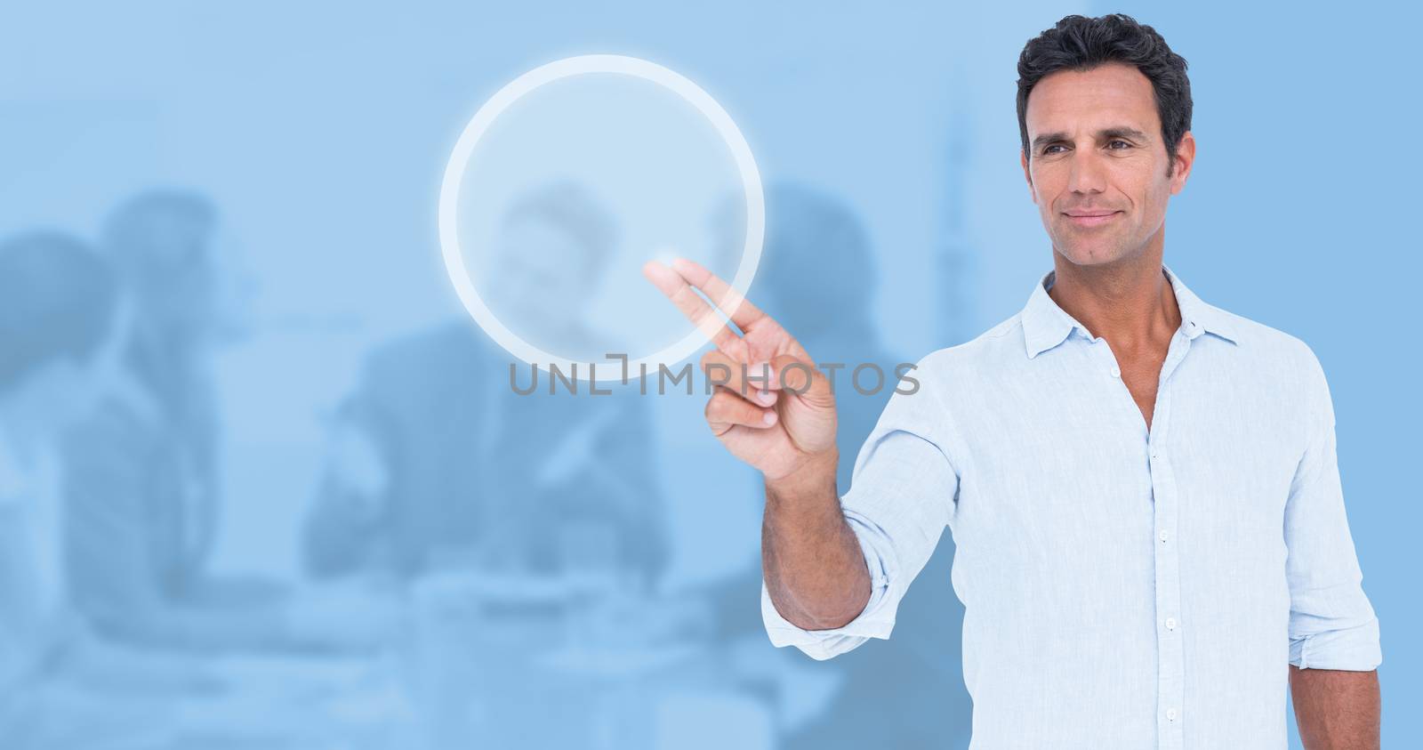 Handsome man making gun gesture against blue background