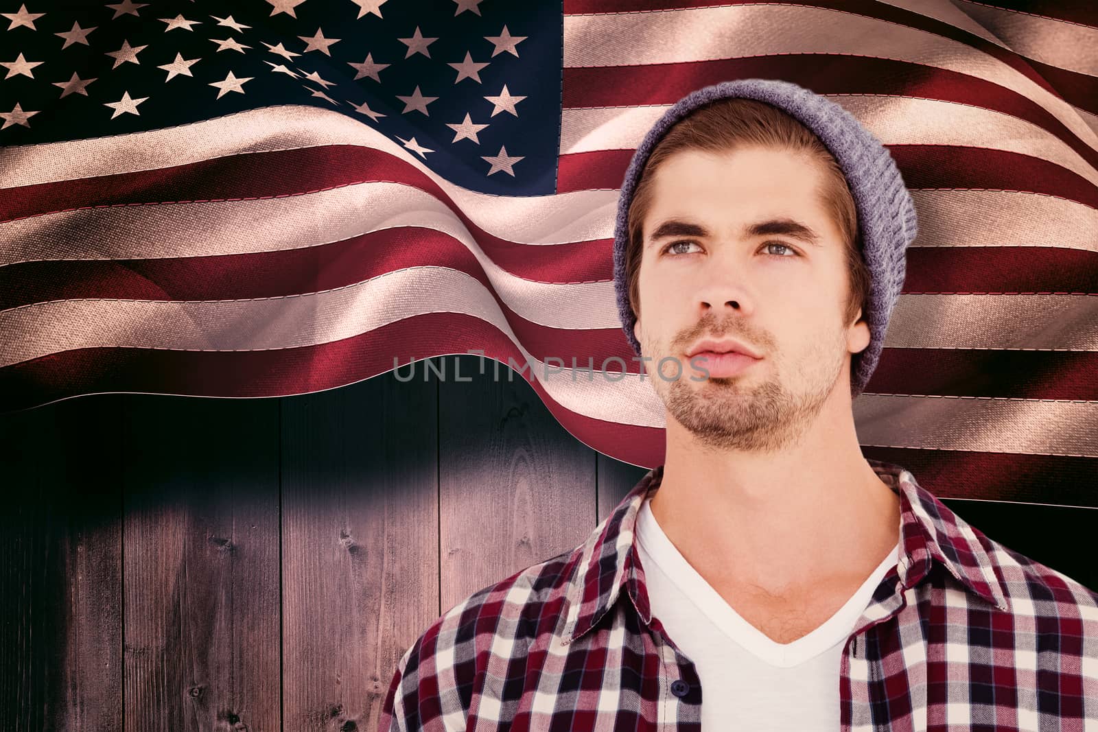 Composite image of confident hipster looking away by Wavebreakmedia