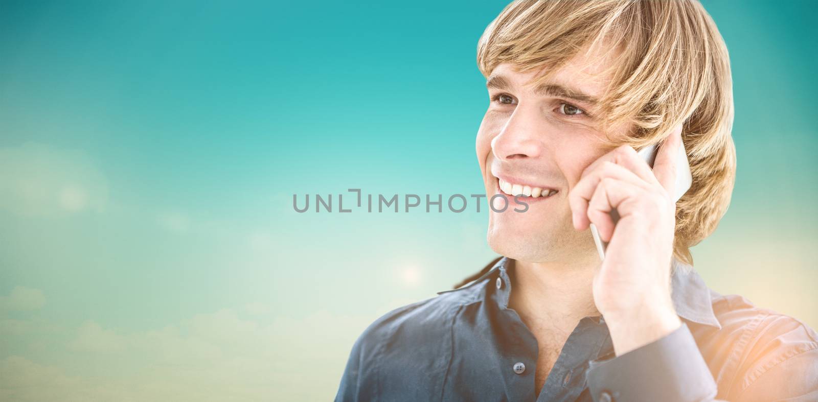 Hipster businessman talking on the phone against blue green background