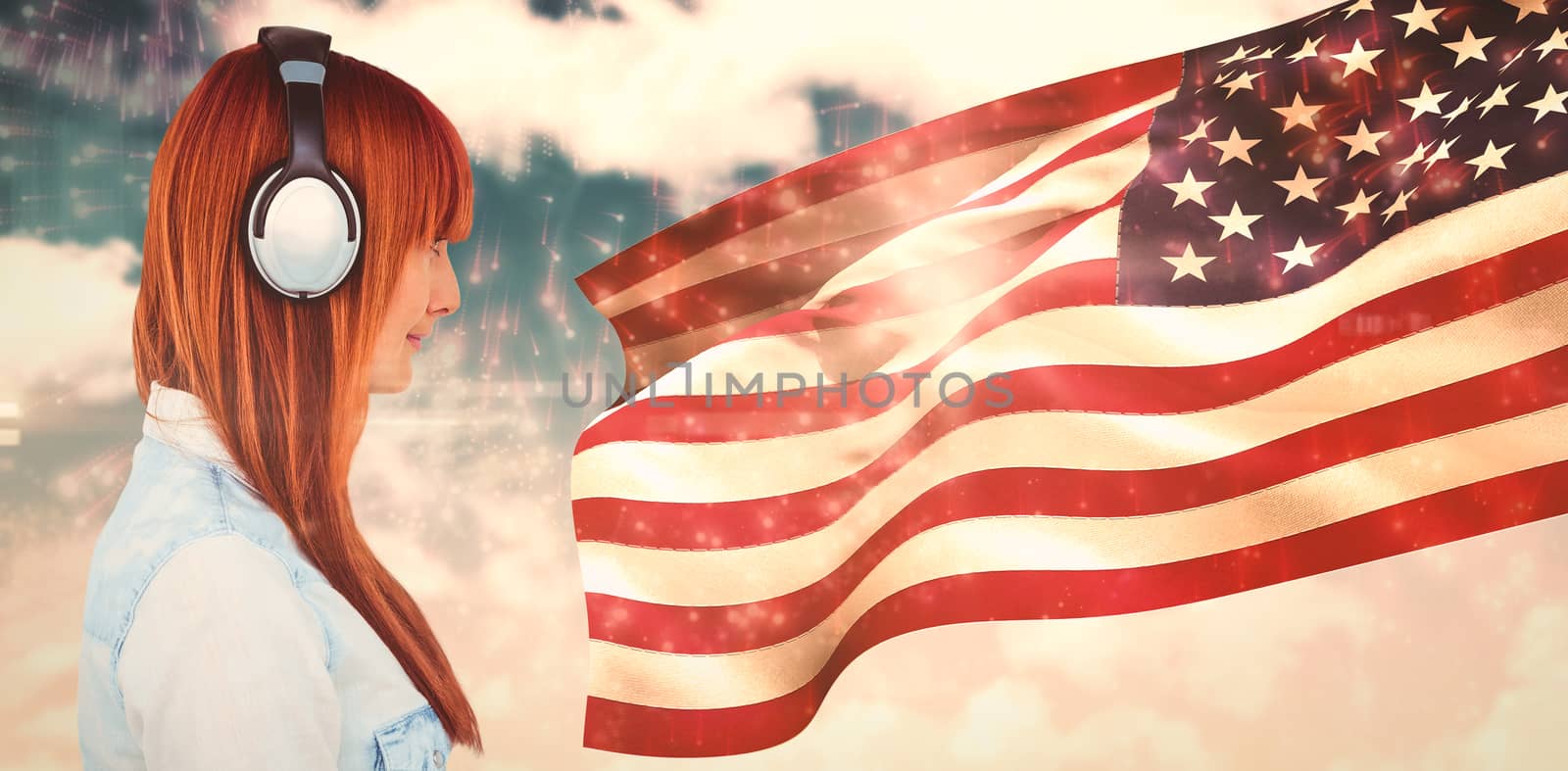 Composite image of gorgeous smiling red haired hipster beside american flag
