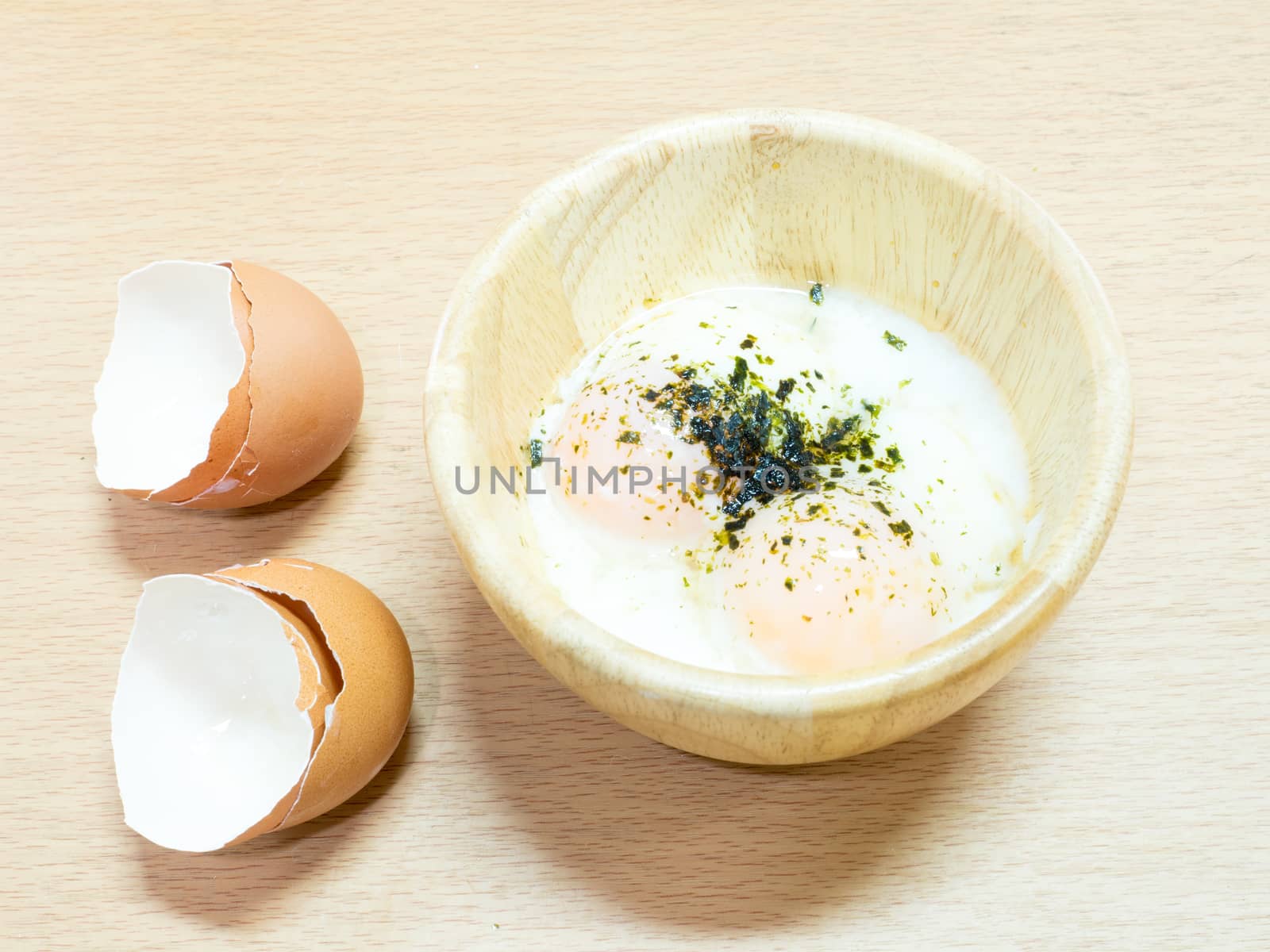 soft boiled egg with eggshell on wooden table