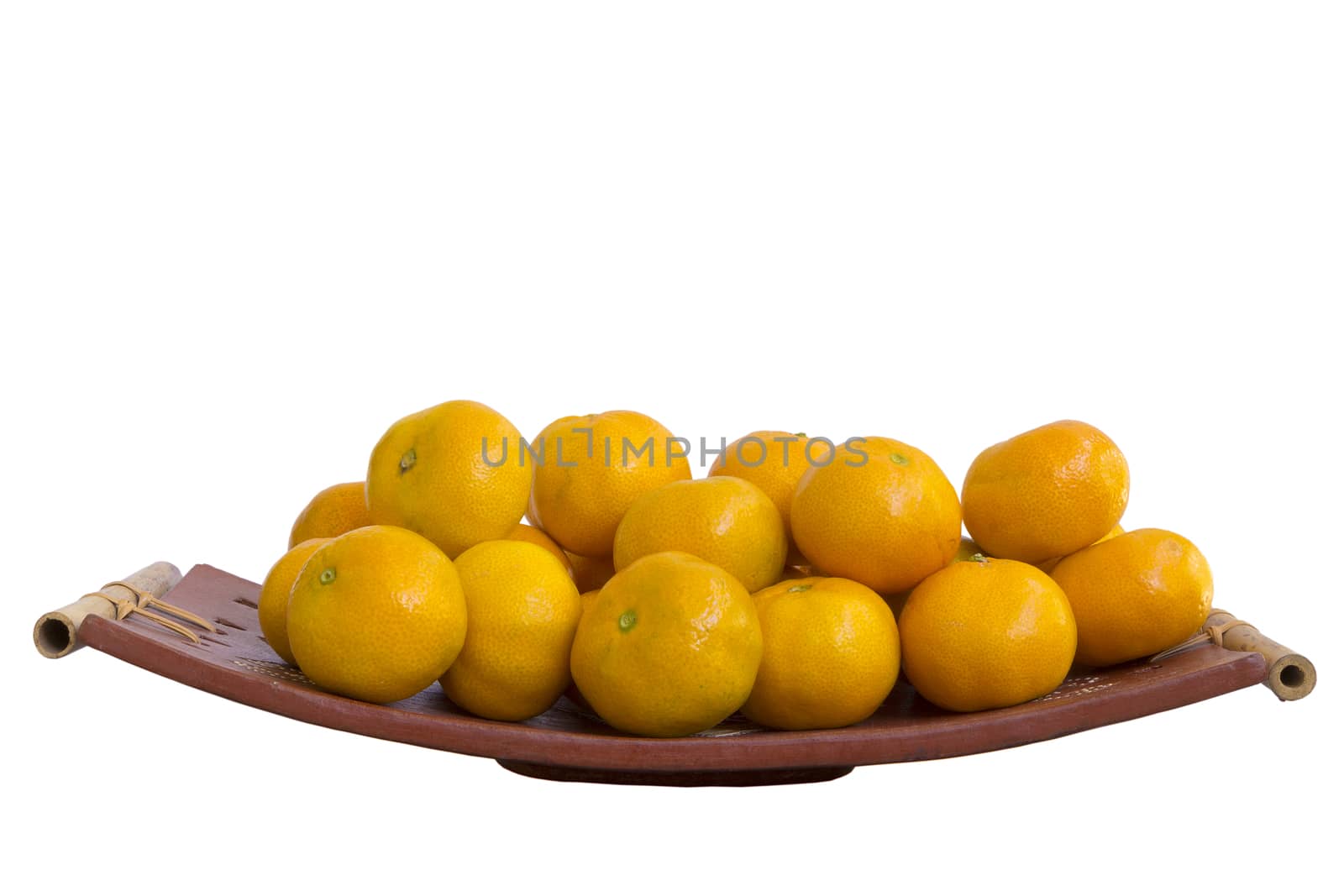 Tangerines on ceramic platter, isolated on white