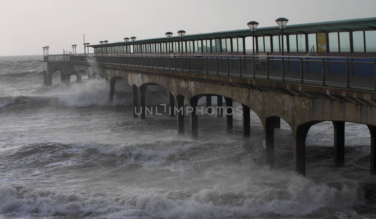 UK, Dorset: Waves crash on the south coast near Dorset as Storm Imogen batters the UK with winds reaching up to 80mph on February 8, 2016. With the UK on amber alert, gale-force winds and heavy rainfall have caused disruption to local train and ferry services. A 64-year-old inspector from the Royal Society for the Prevention of Cruelty to Animals reportedly went missing Sunday.