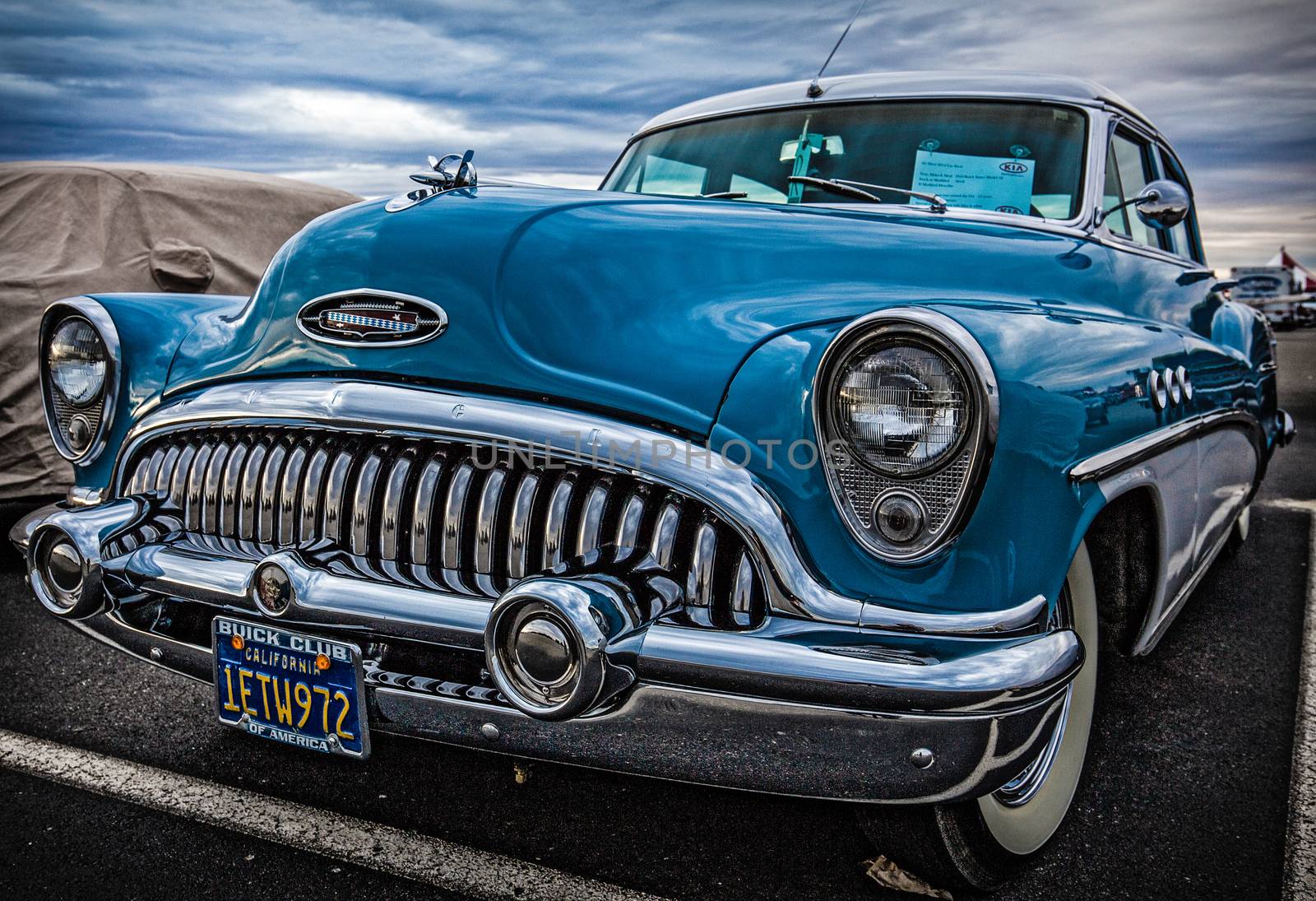 Redding, California, USA-September 28, 2014: A restored 1950's era Buick Skylark is on display at a car show in Redding and shows off it's unique chrome grill and blue paint.