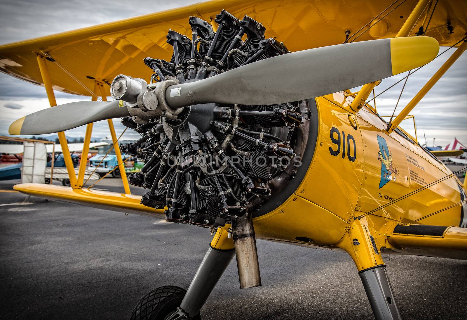 Redding, California, USA- September 28, 2014: A high performance stunt biplane and its engine are on display at an airshow in Northern California.