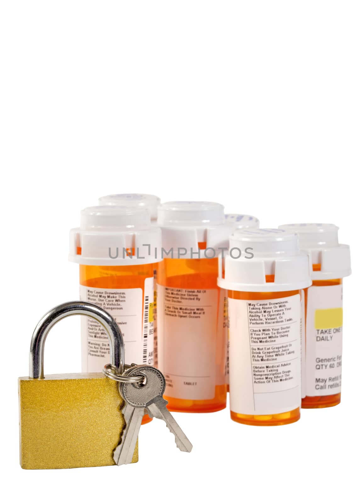 Concept of locking up your narcotic prescriptions.  Keep them safe.  Selective focus on the lock and keys only and bottles are out of focus