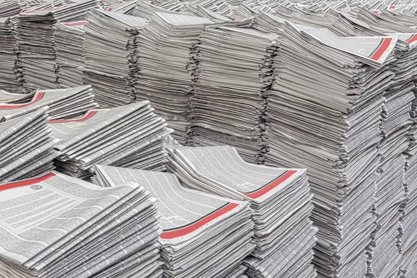 Stacks of newly printed newspapers