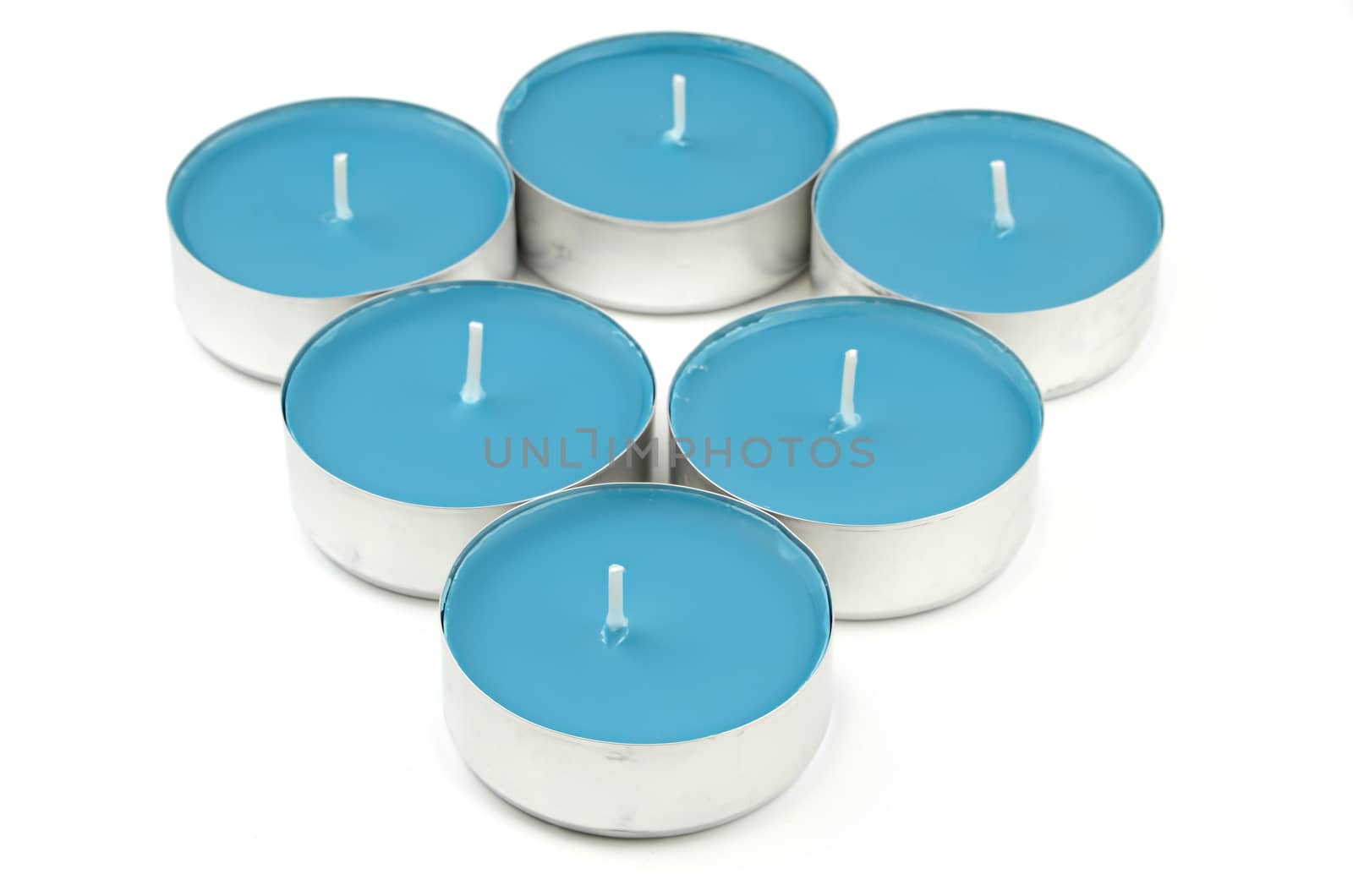 Blue Tea Lights for Relaxation on white background
