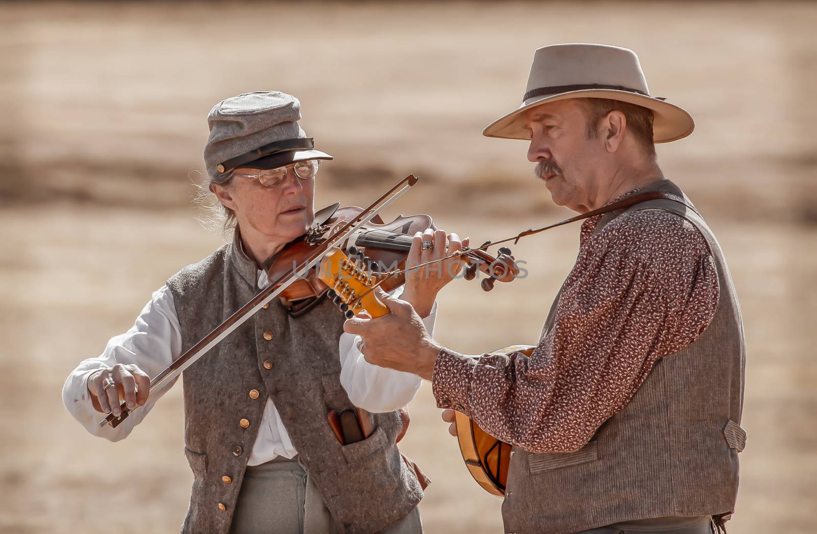 A band dressed as Civil War era musicians play during a break in the action at a Civil War reenactment in Anderson, California.
Photo taken on: September 27th, 2014