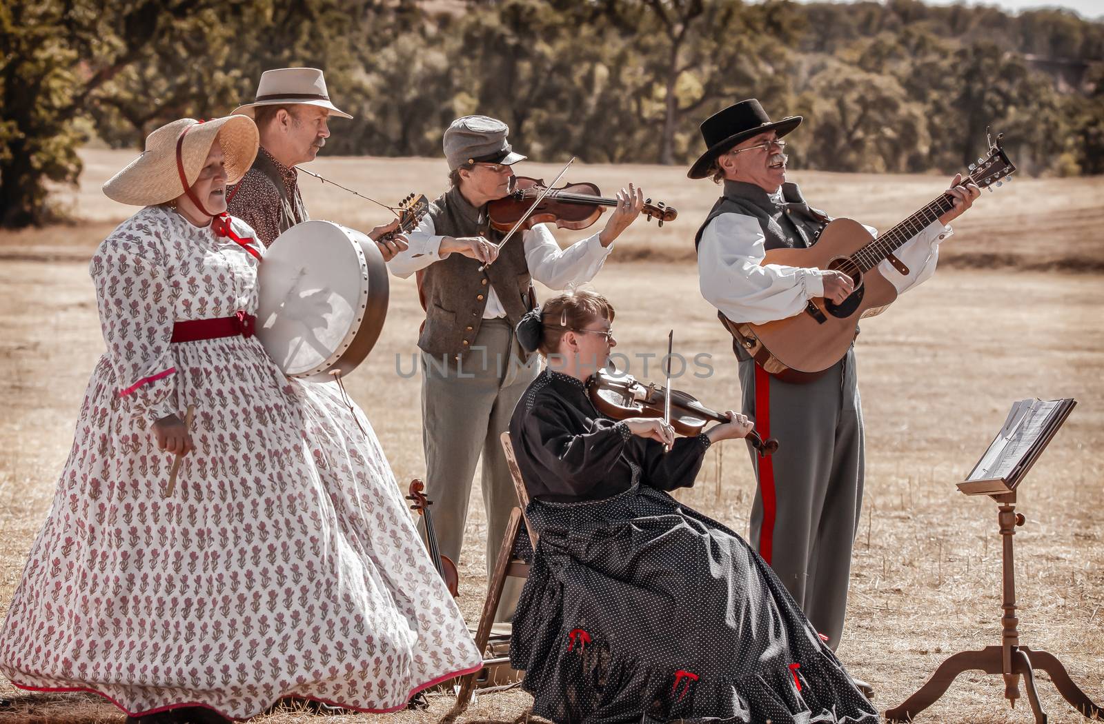 A band dressed as Civil War era musicians play during a break in the action at a Civil War reenactment in Anderson, California.
Photo taken on: September 27th, 2014