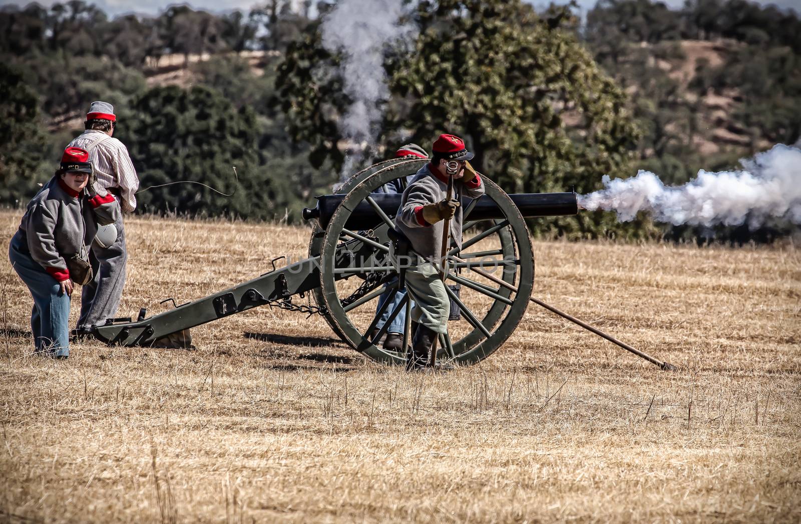 Confederate troops fire their cannon during a Civil War reenactment in Anderson, California.
Photo taken on: September 27th, 2014