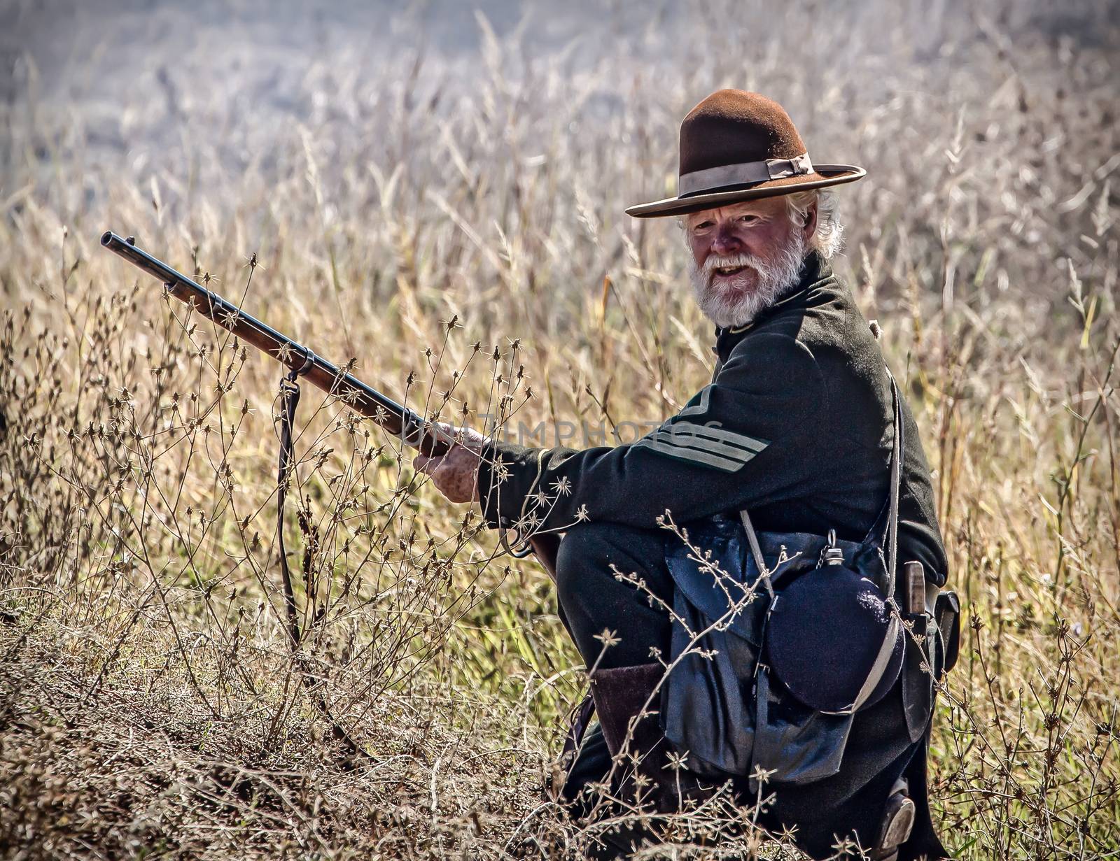 Union sharpshooter looks for targets during a Civil War reenactment in Anderson, California.
Photo taken on: September 27th, 2014