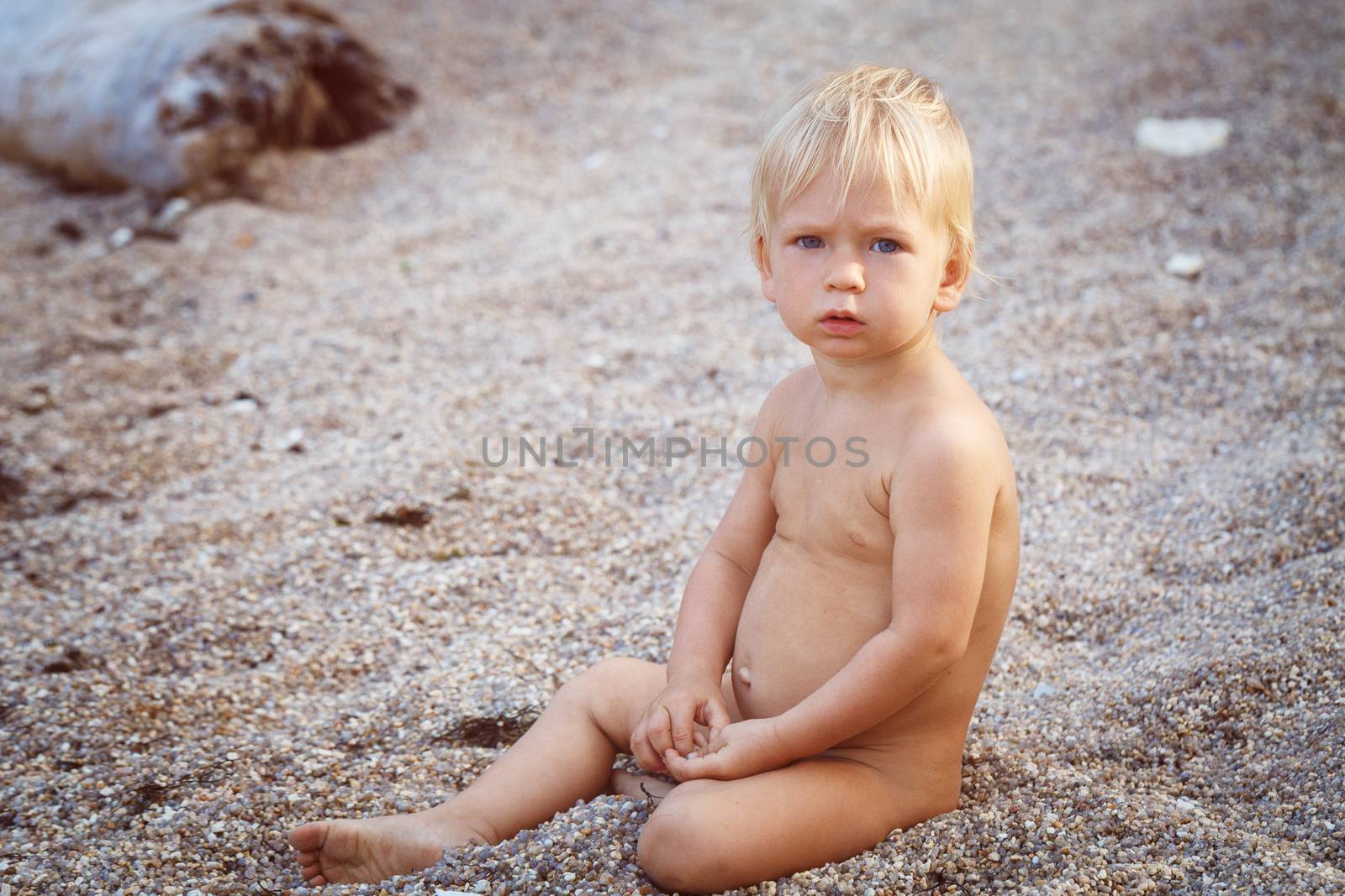 Little boy on the sand  by gorov108