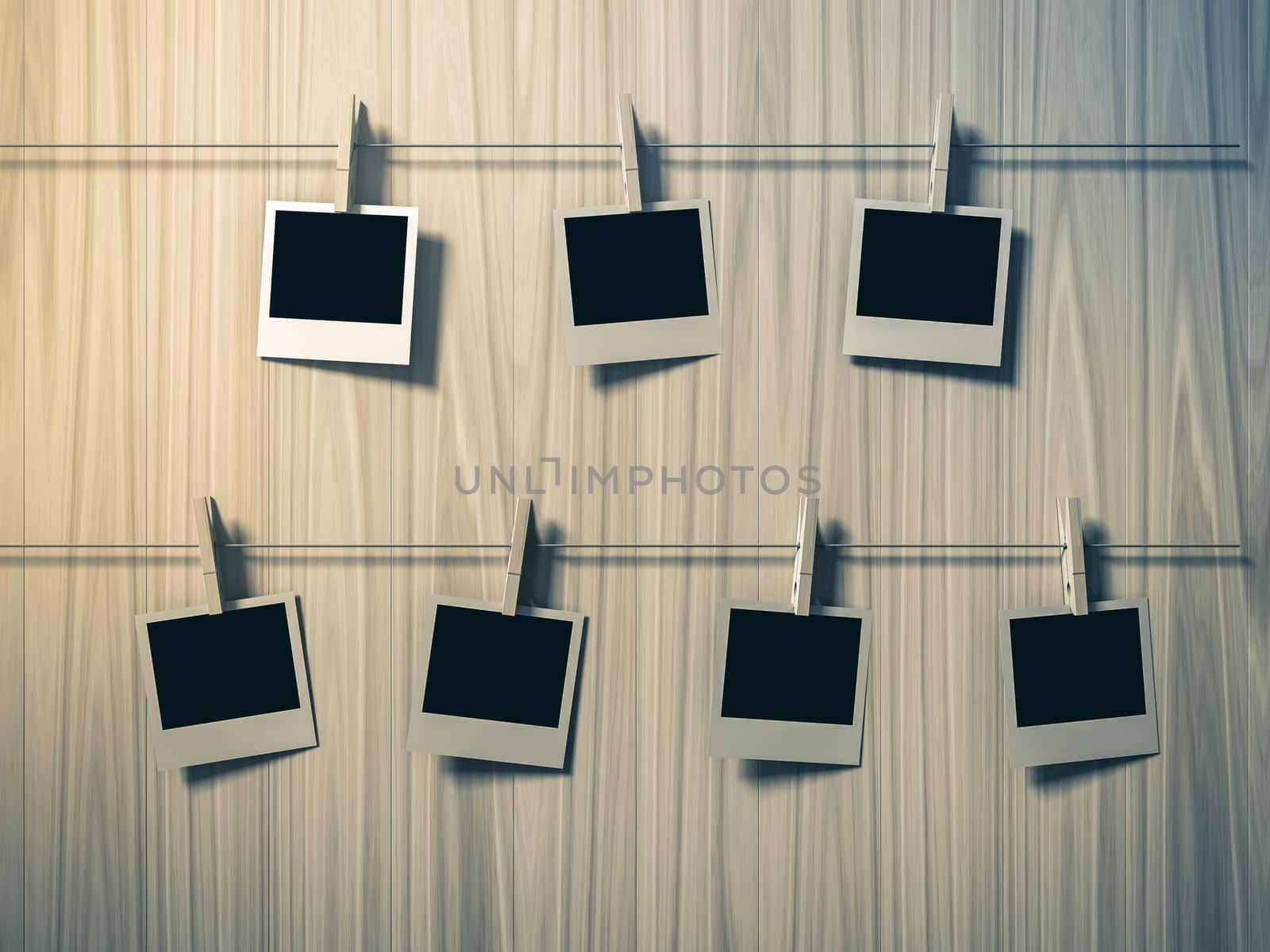 empty photos frames on wood background by teerawit