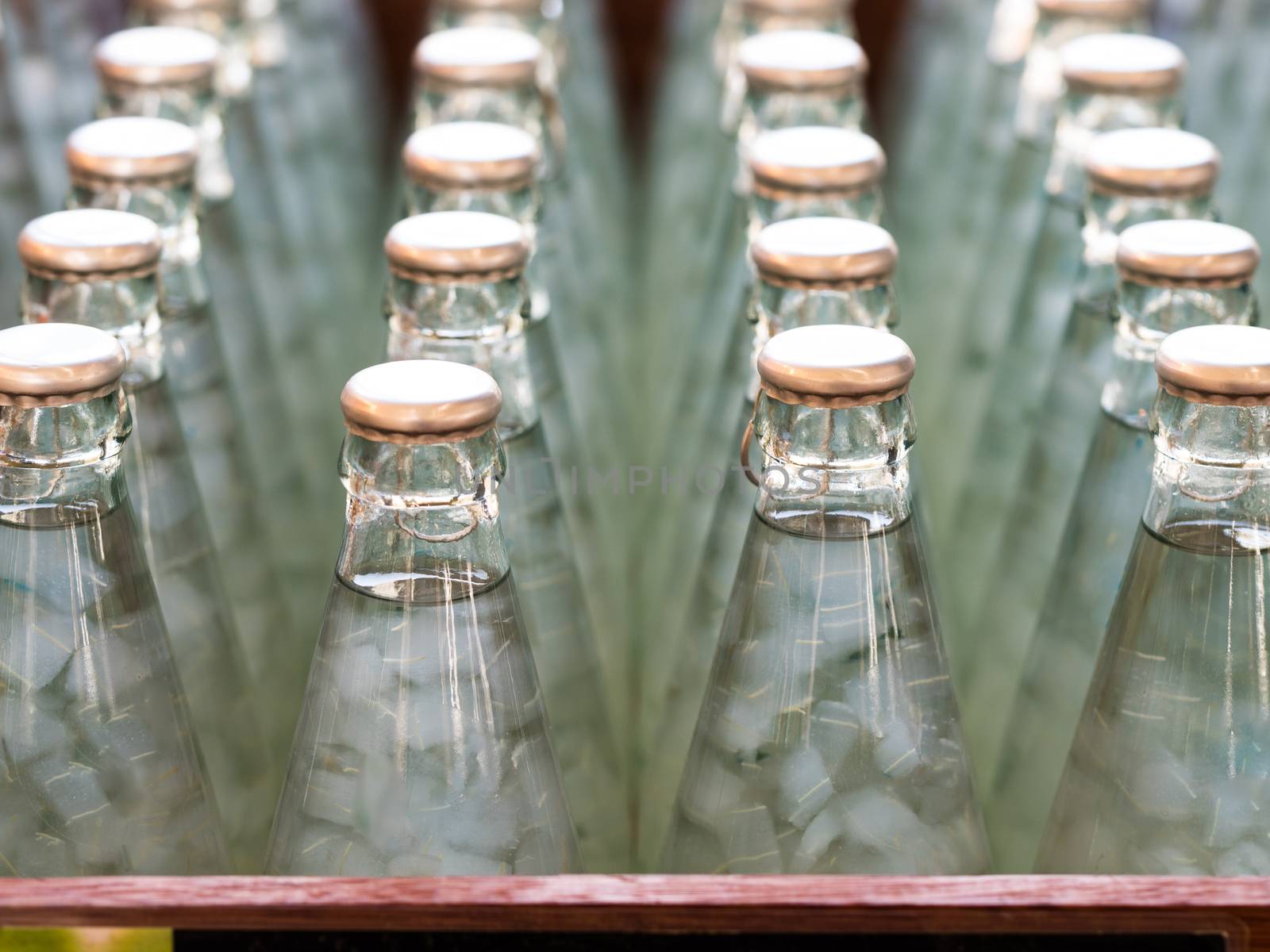 bottles of Nata de coco in syrup, select focus