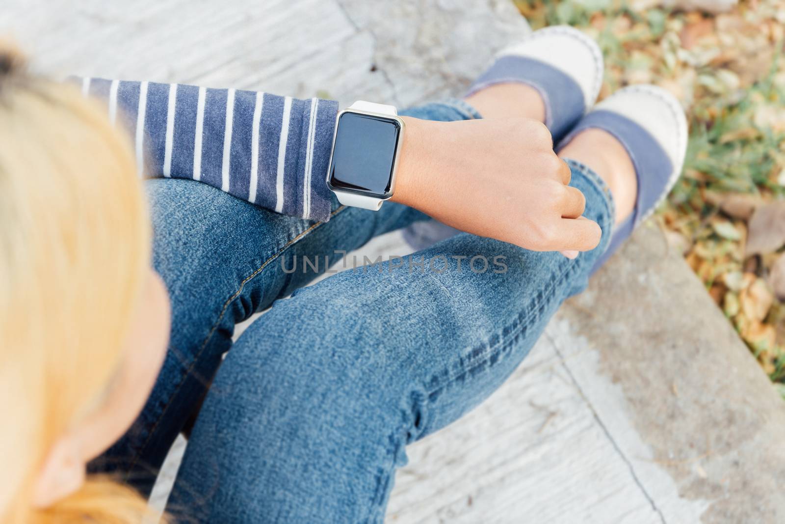 hipster woman looking smart watch new technology