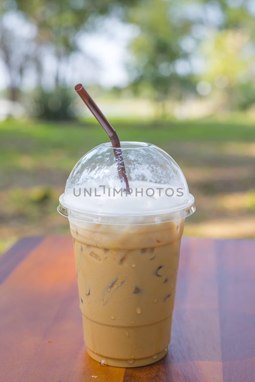 Cold milk coffee and ice in glass