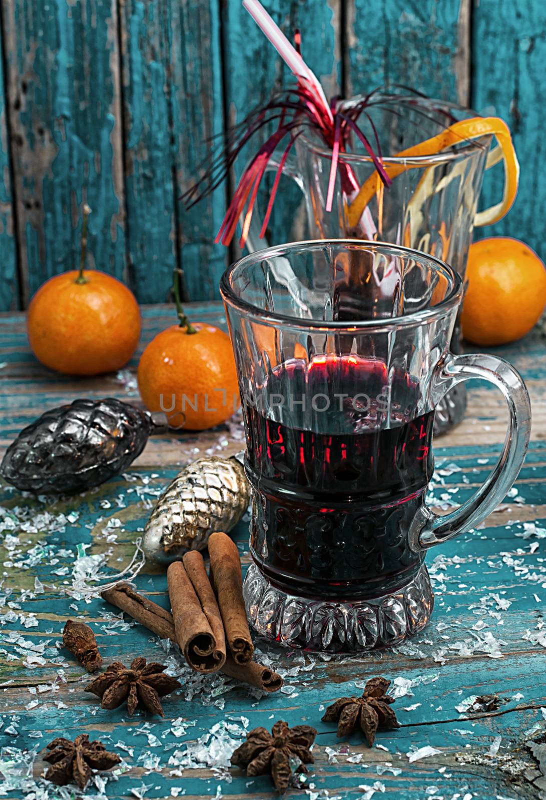 glass of mulled glass of mulled wine with spices in retro style wine 