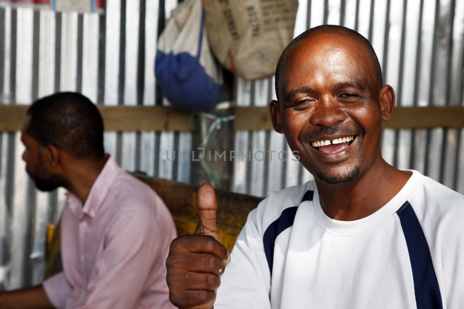 Stone Town, Zanzibar - Decamber 30, 2015: Unknown African man posing outside Stone Town. Zanzibar