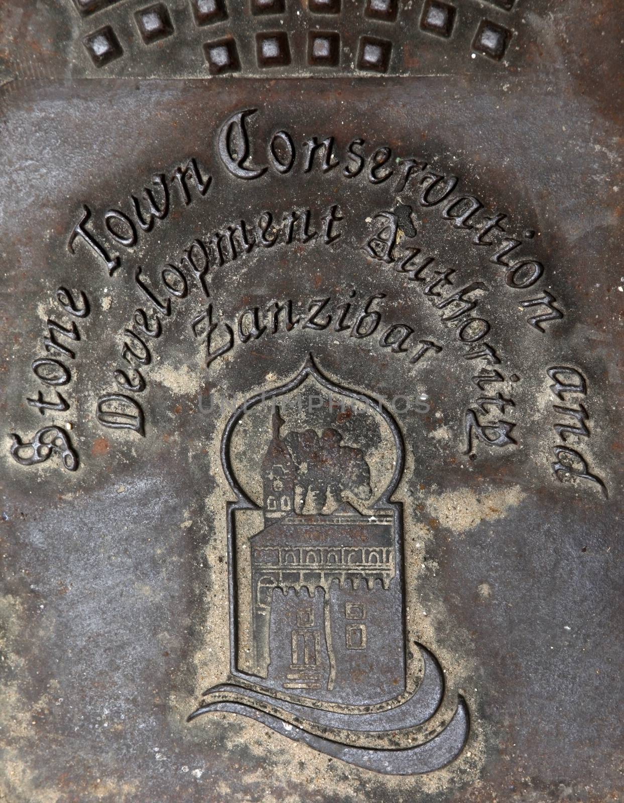 Stoun Town, Tanzania - December 30, 2015:traditional building in the iron manhole cover in Stone Town, Zanzibar