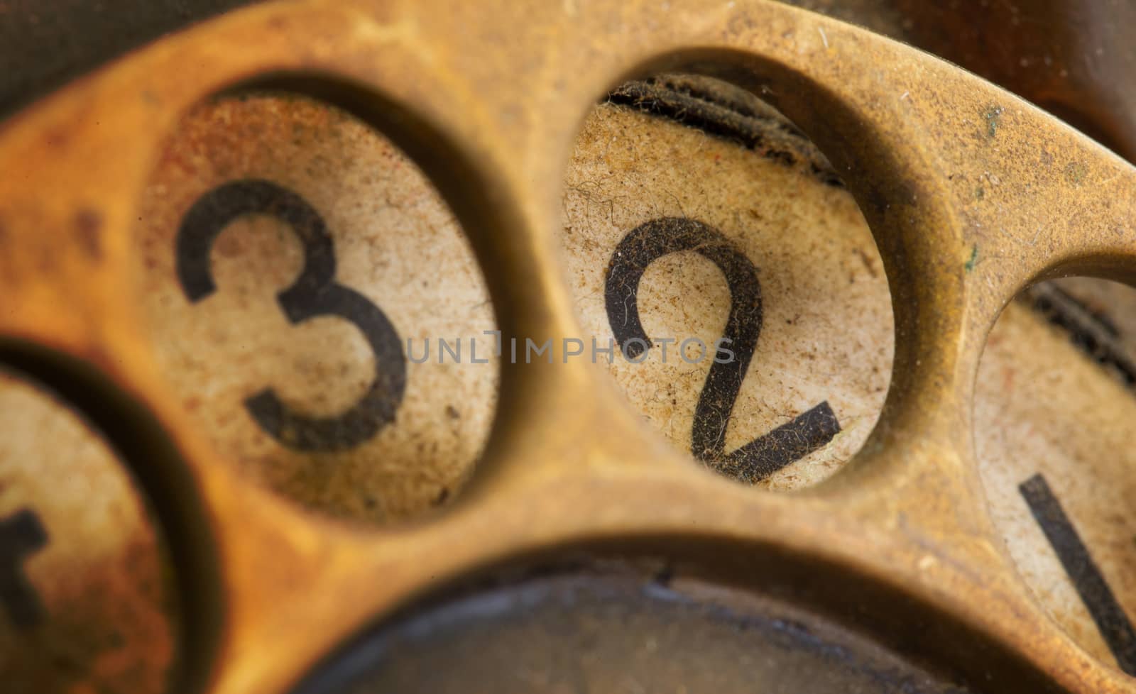 Close up of Vintage phone dial, dirty and scratched - 2, perspective