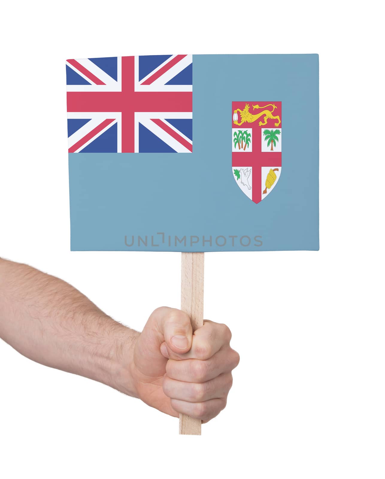 Hand holding small card - Flag of Fiji by michaklootwijk