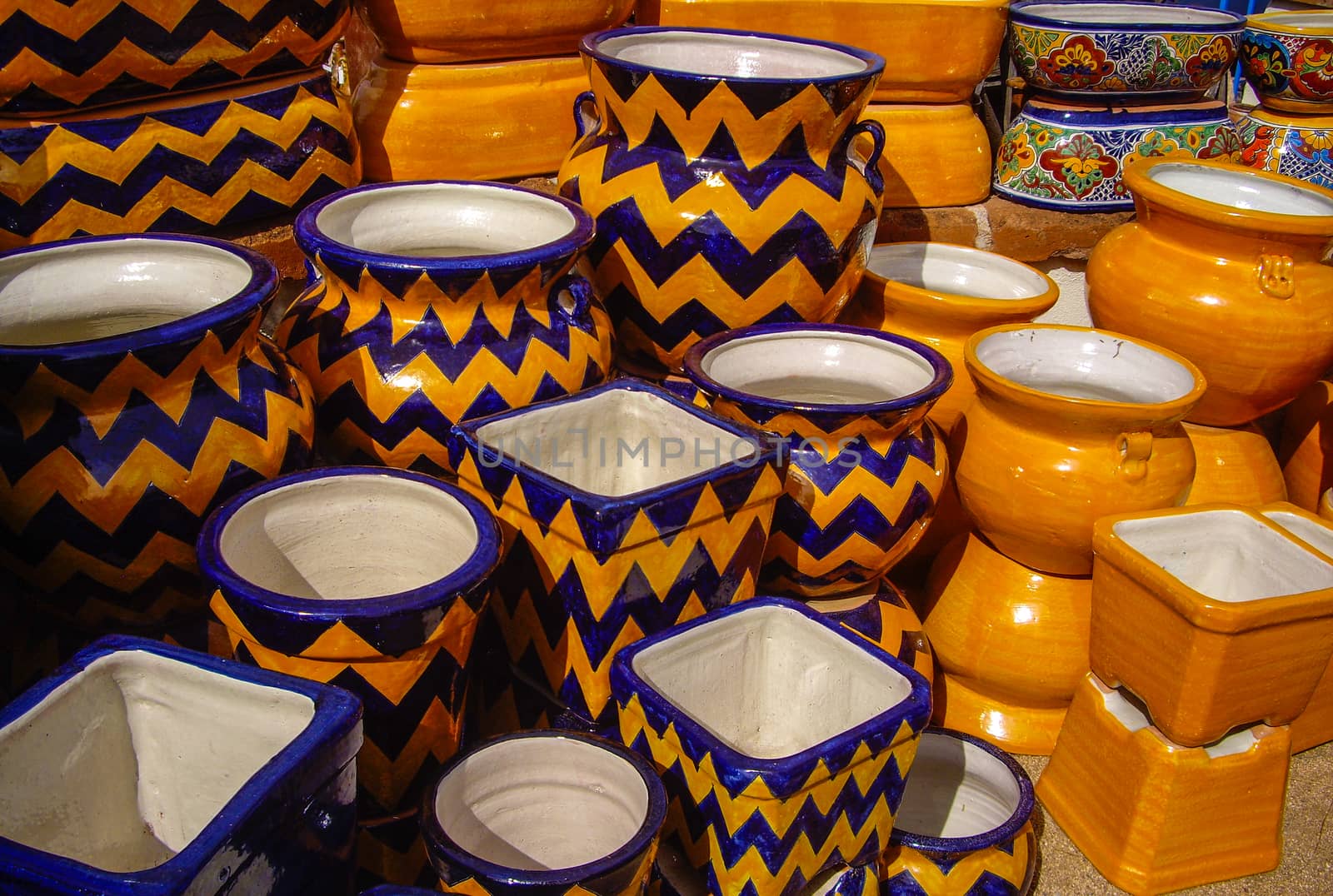 Large orange and blue Mexican pots by emattil